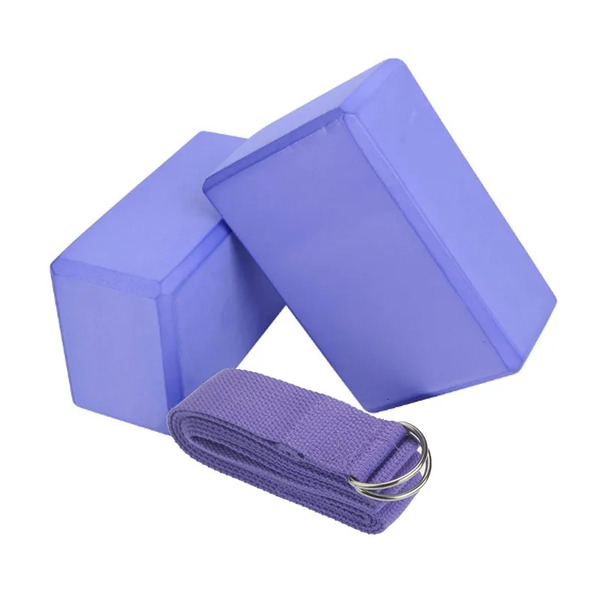 Folded blanket, block and strap — simple tools for home stretching